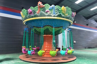 Sillas voladoras de dinosaurios - Atracciones familiares