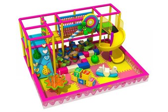 Zona de juego interior temática caramelo con juegos blandos
